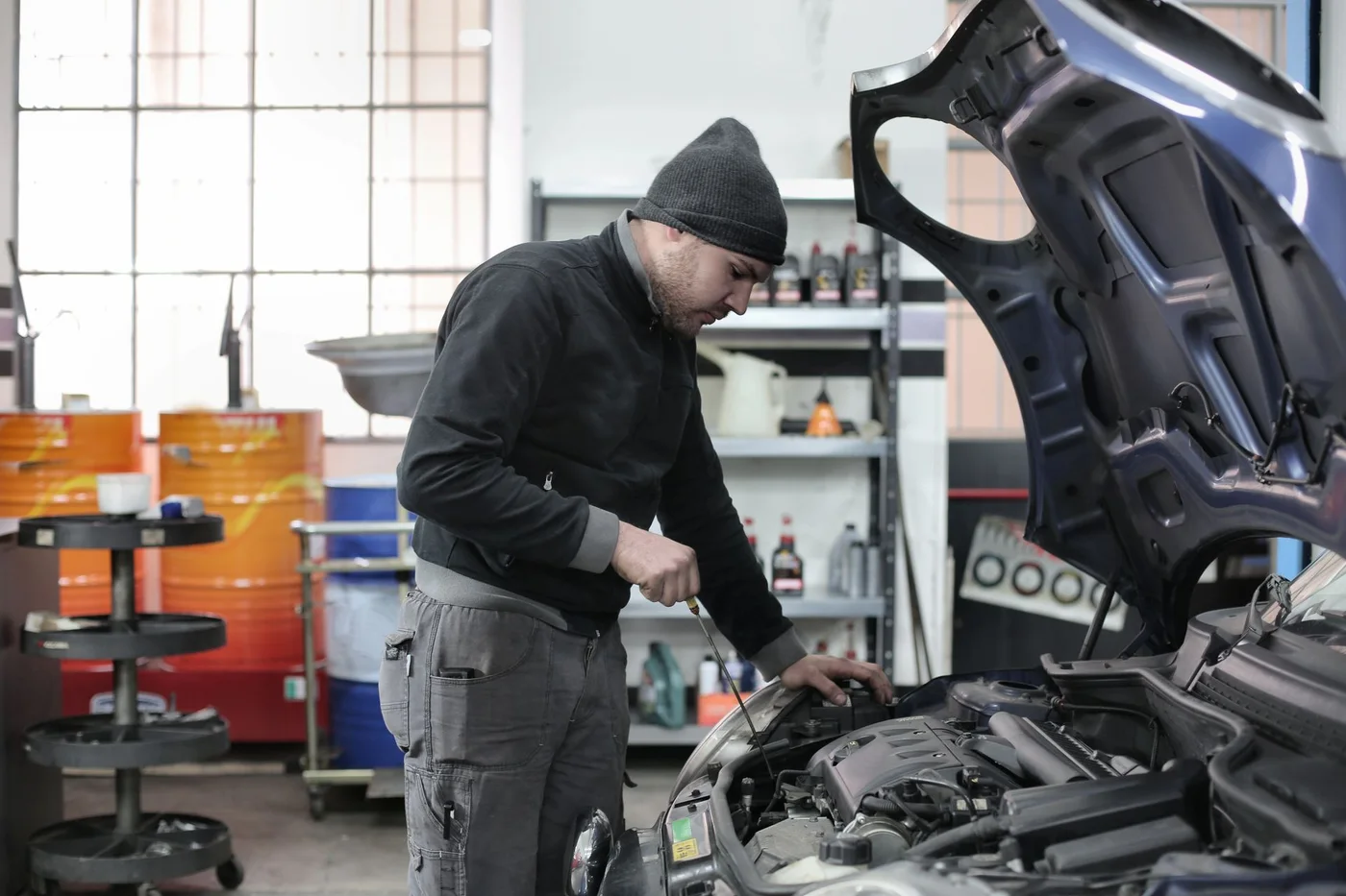 Stock photograph illustrating hands-on vehicle care