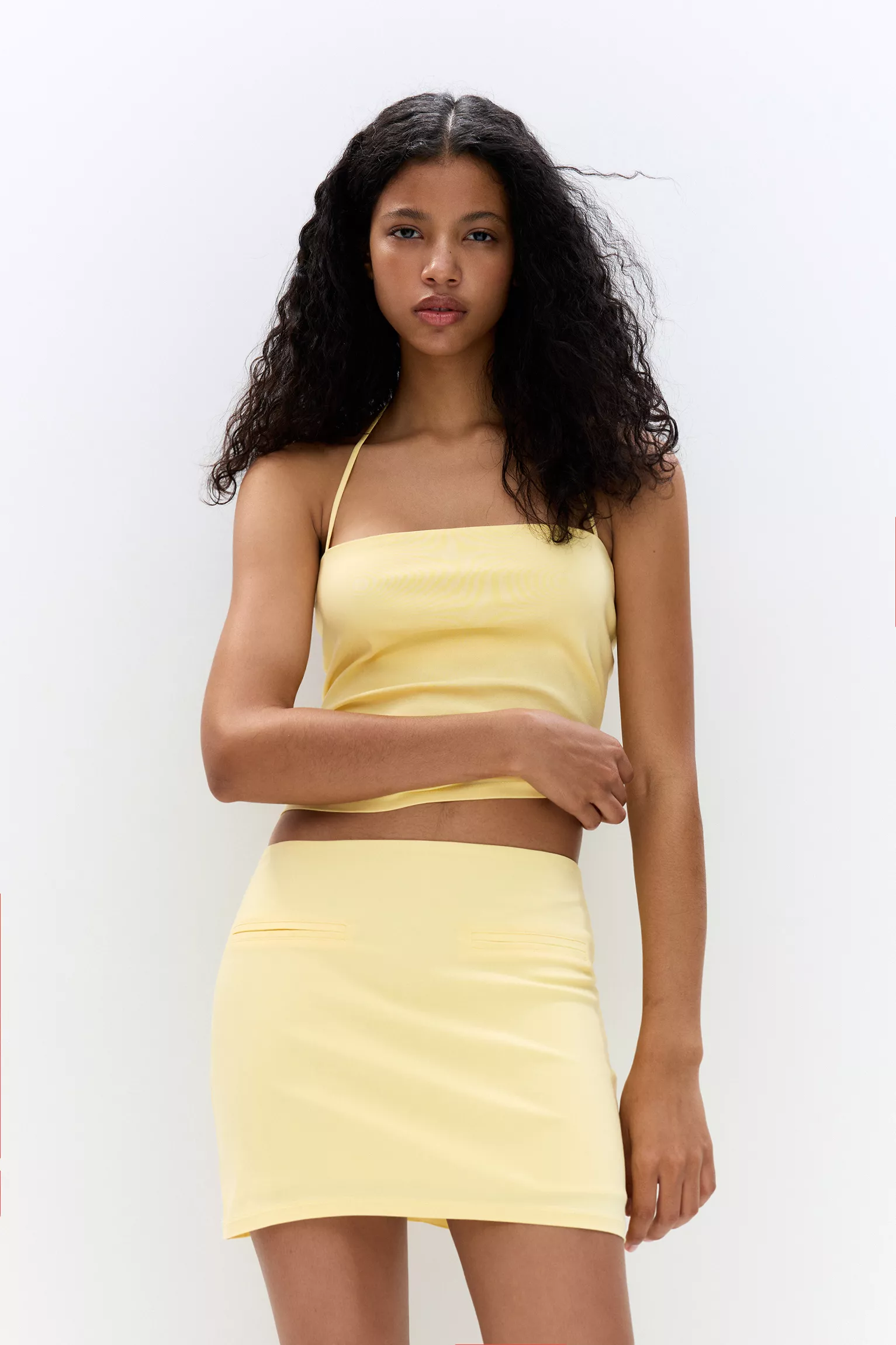 Short sleeveless dress with gathering